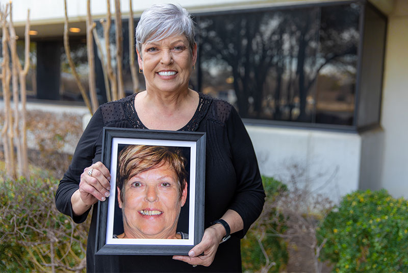 Janet - holding her before picture and smiling